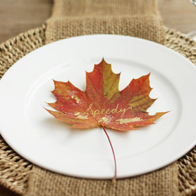 fall place cards made from gorgeous fall leaves touched with gold foil