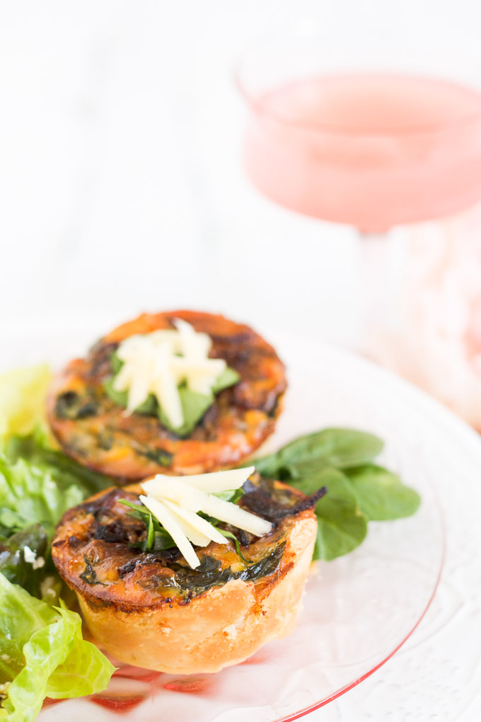 Caramelized Onion, Spinach, & White Cheddar Quiche would be the perfect addition to your Mother's Day brunch menu.