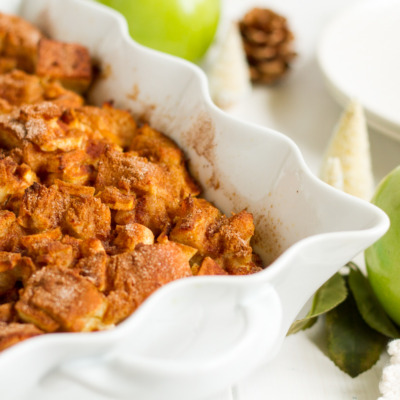 A perfect holiday breakfast for the whole family! This easy stuffed french toast casserole is filled with cinnamon, apples, cream cheese, and chunks of crusty french bread soaked in a sweet, cinnamon-custard sauce. Let it sit in the fridge overnight, then pop it in the oven when you wake up. It will fill your whole house with mouthwatering apple-cinnamon smells while it bakes, and will make tummies happy with every maple syrup-covered bite. For big families or breakfast guests, just double the recipe and bake it in a 9x13" pan.