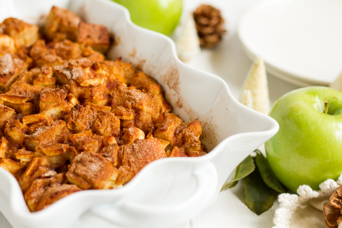 A perfect holiday breakfast for the whole family! This easy stuffed french toast casserole is filled with cinnamon, apples, cream cheese, and chunks of crusty french bread soaked in a sweet, cinnamon-custard sauce. Let it sit in the fridge overnight, then pop it in the oven when you wake up. It will fill your whole house with mouthwatering apple-cinnamon smells while it bakes, and will make tummies happy with every maple syrup-covered bite. For big families or breakfast guests, just double the recipe and bake it in a 9x13" pan.