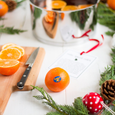 These easy spiced cider with cinnamon, cloves, and cuties is a perfect gift to put together for friends, neighbors, and teachers!