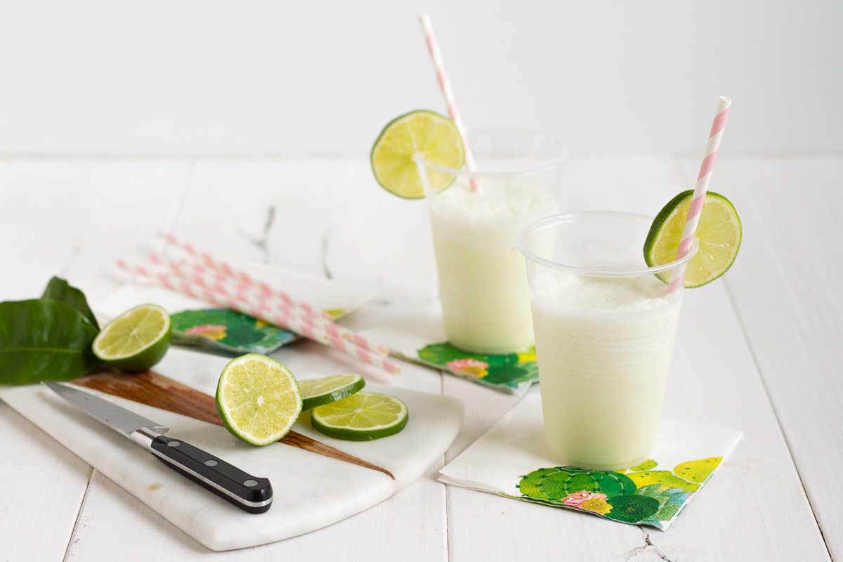 This refreshing limeade is the perfect mix of creamy and frosty, and a sure way to beat the heat this summer!