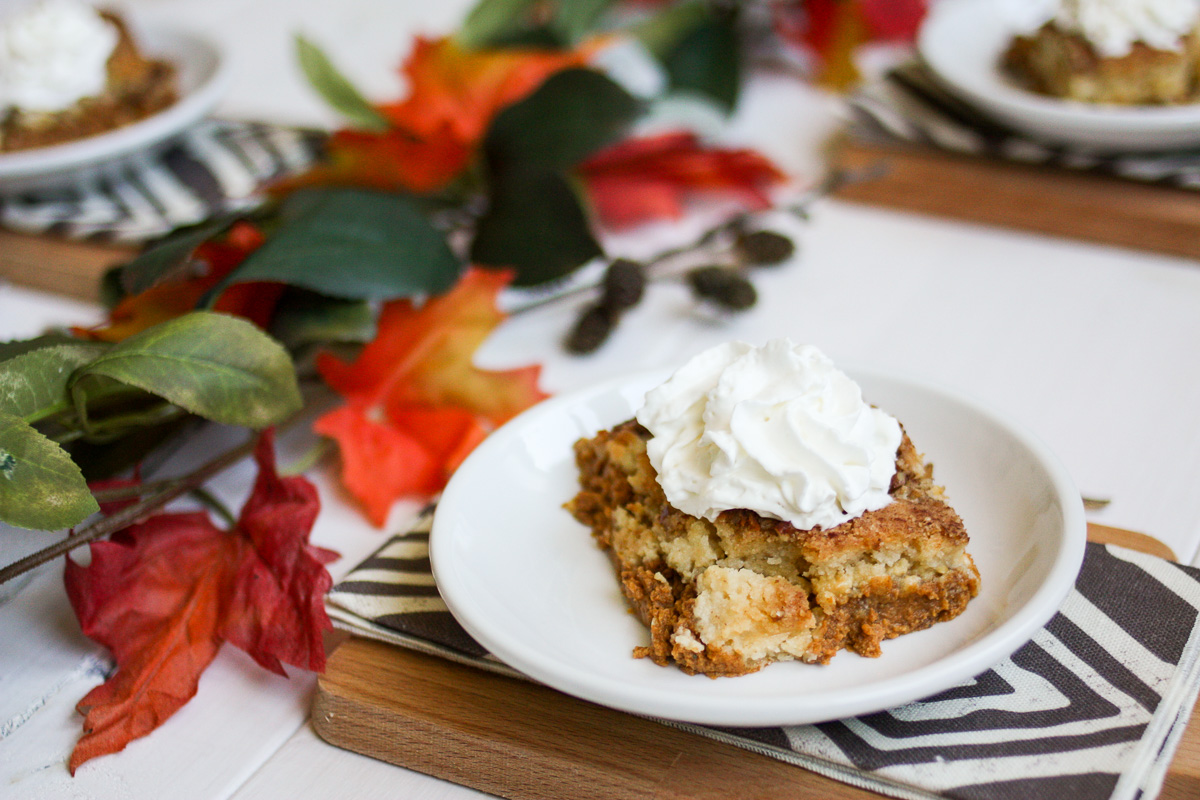 Pumpkin pie cake is a long-time family favorite from both my mom and my mother-in-law. A layer of pumpkin custard is topped with a crumbly cake layer, melted butter, crunchy pecans, and a sprinkle of cinnamon. The perfect dessert for fall!